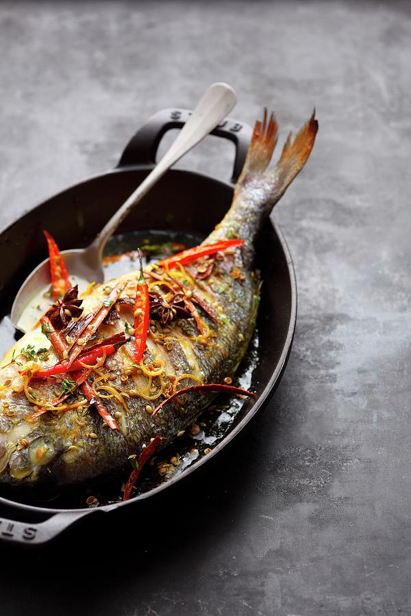 Gilthead Seabream With Spiced Butter Photograph by Jalag / Mathias Neubauer
