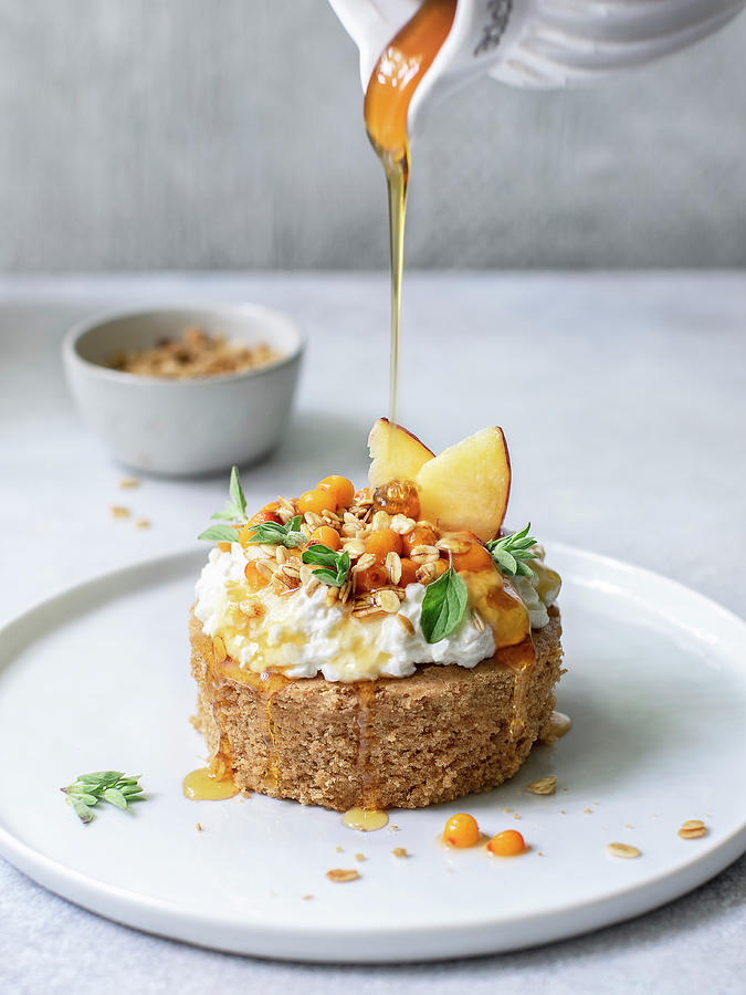 Ginger Bread Spongecake With Ricotta, Buckthorns And Honey Photograph by Maria Squires