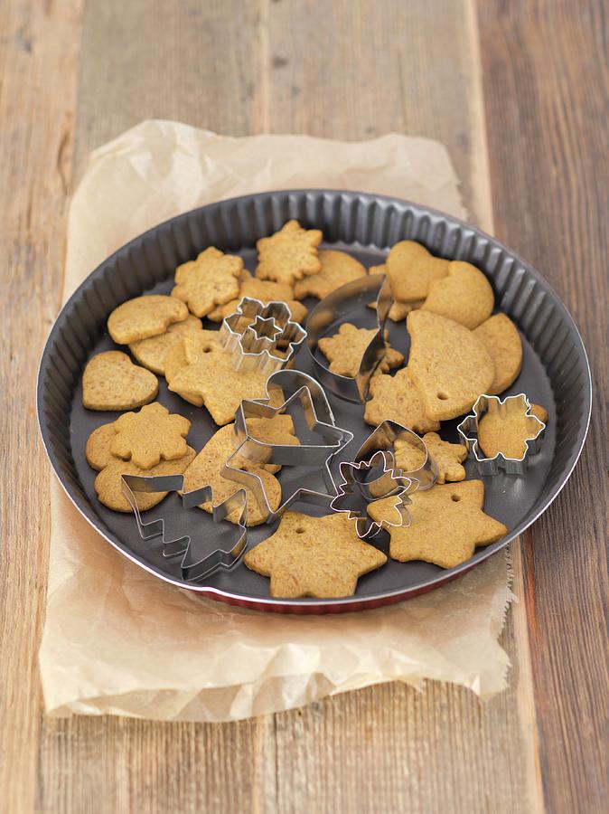 Gingerbread Biscuits With Cutters Photograph by Rua Castilho