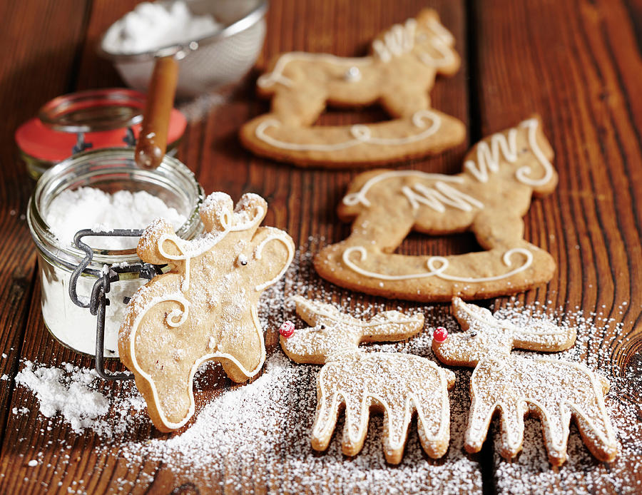 Gingerbread Biscuits With Icing And Icing Sugar Photograph by Teubner Foodfoto
