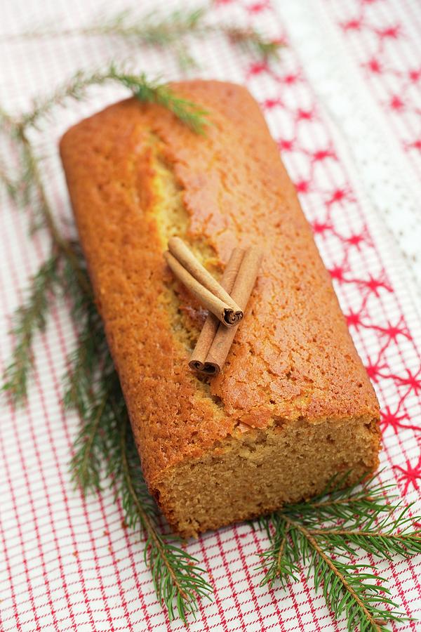 Gingerbread Cake With Cinnamon Sticks And A Pine Sprig Photograph by Lydie Besancon