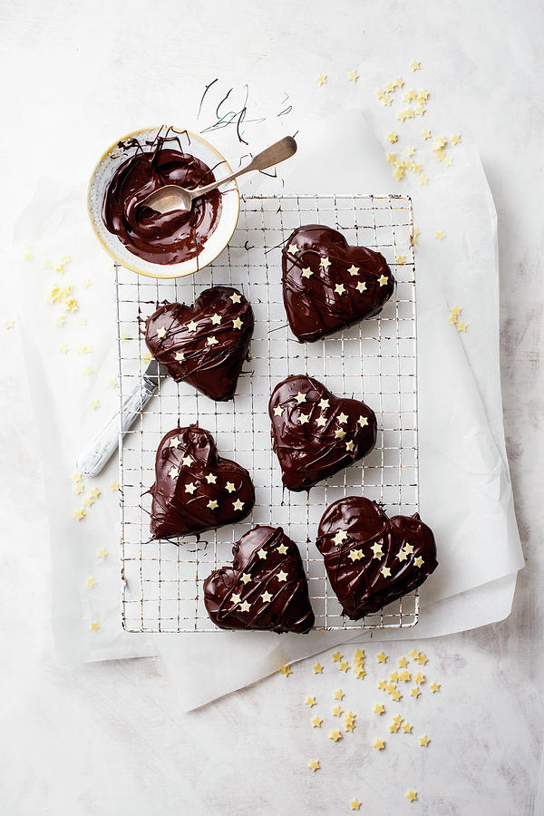 Gingerbread Hearts With Jam And Chocolate Glaze On A Wire Rack Photograph by Magdalena Hendey