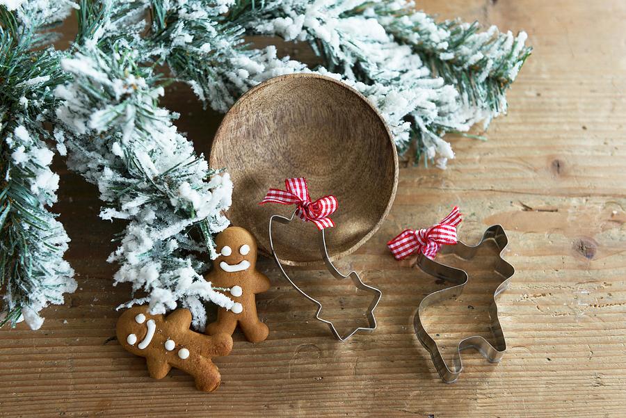 Gingerbread Men And Festive Cookie Cutters Photograph by Veronika Studer