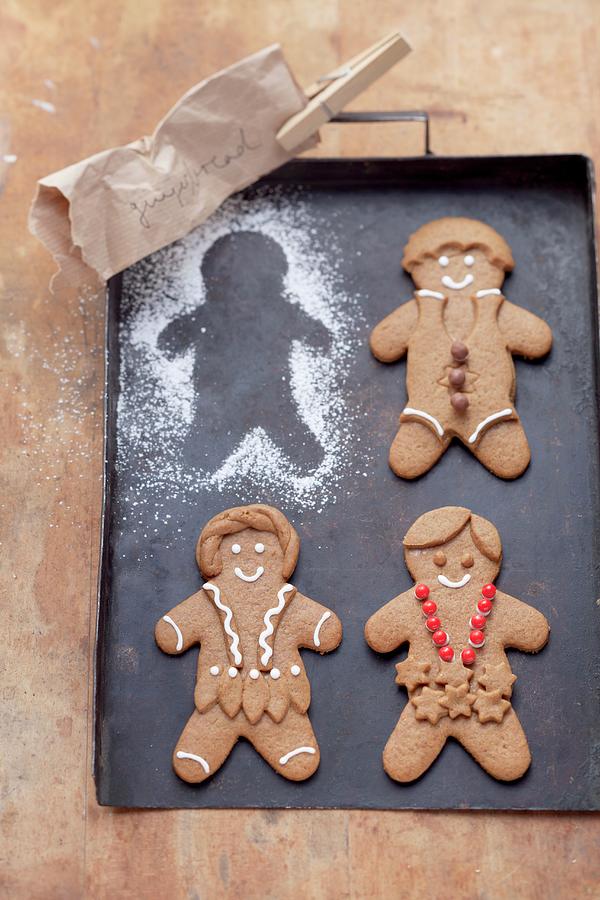 Gingerbread Men On A Baking Tray Photograph by Eising Studio - Food Photo & Video