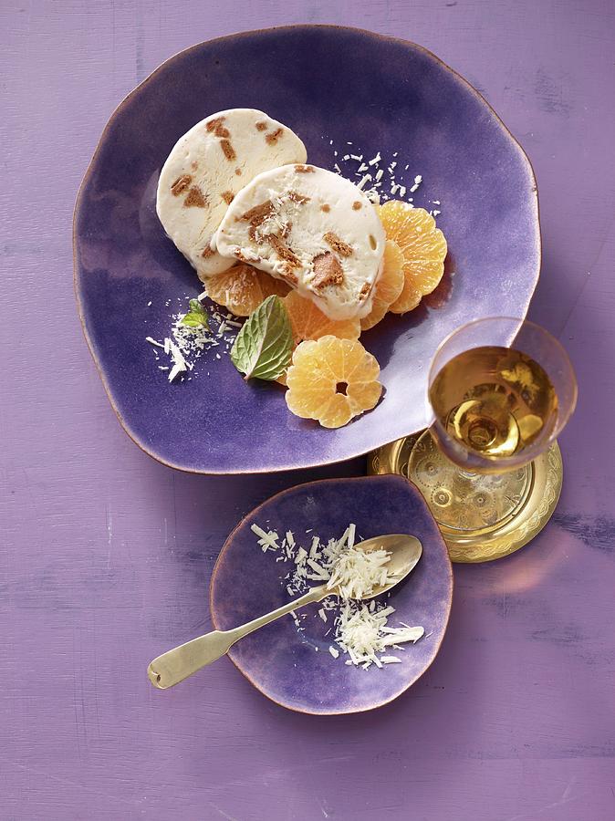 Gingerbread Parfait On Orange Slices With Grated White Chocolate Photograph by Nikolai Buroh