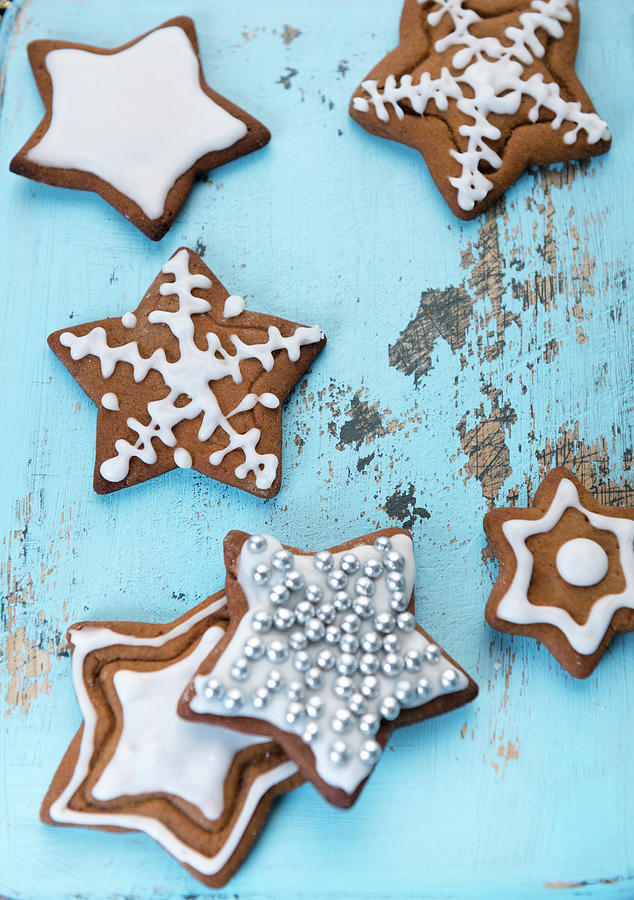 Gingerbread Stars Decorated With Icing Sugar And Silver Pearls Photograph by Komar