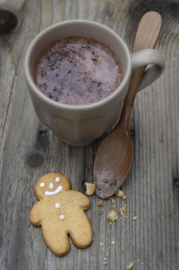 Gingermen Biscuits And A Cup Of Chocolate Photograph by Keroudan