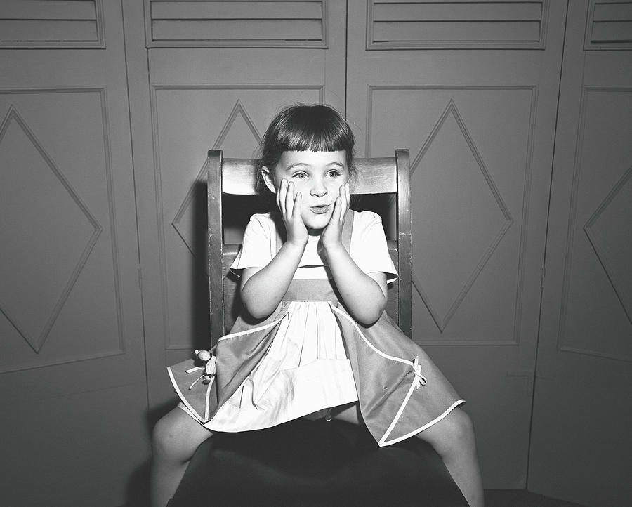 Girl 5-5 Sitting Astride Chair, Making Photograph by George Marks