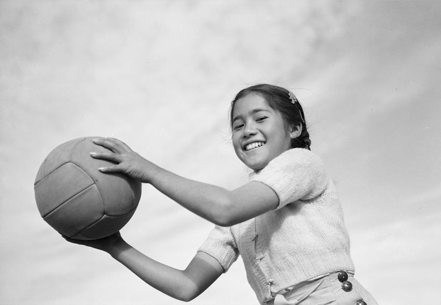 Girl and volley ball  Manzanar Relocation Center  California by  photograph by Ansel Adams Painting by Celestial Images