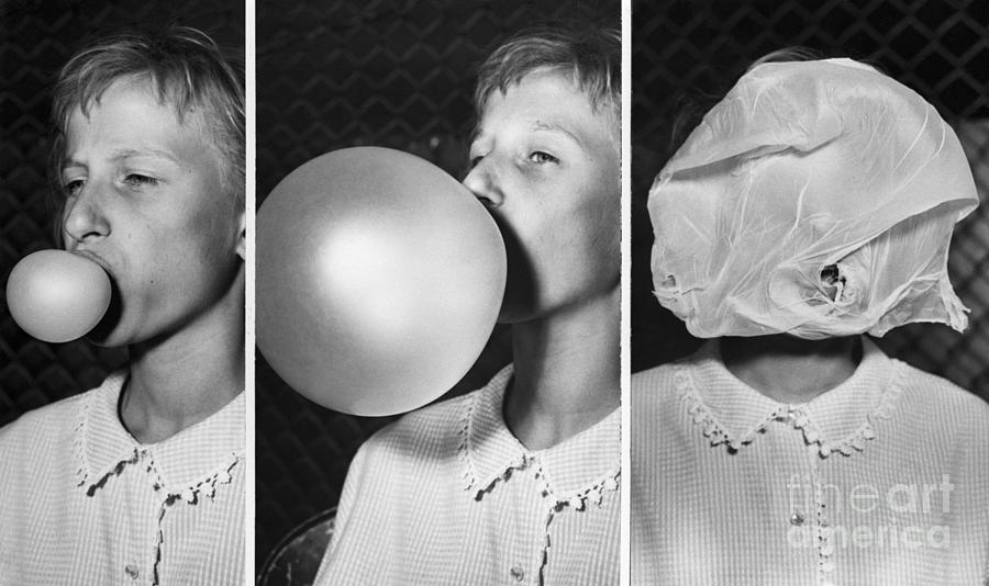 Girl Blowing Bubble In Contest Photograph by Bettmann