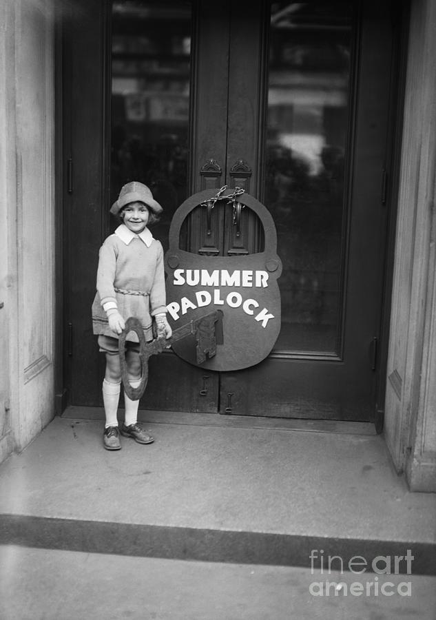 Girl Locks Door With Huge Padlock Photograph by Bettmann