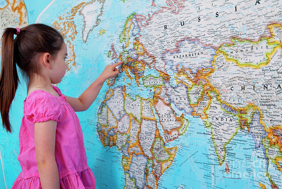 Girl Looking At Map Of Europe Photograph by Conceptual Images/science Photo Library