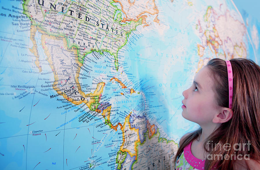 Girl Looking At Map Of The Usa Photograph by Conceptual Images/science Photo Library