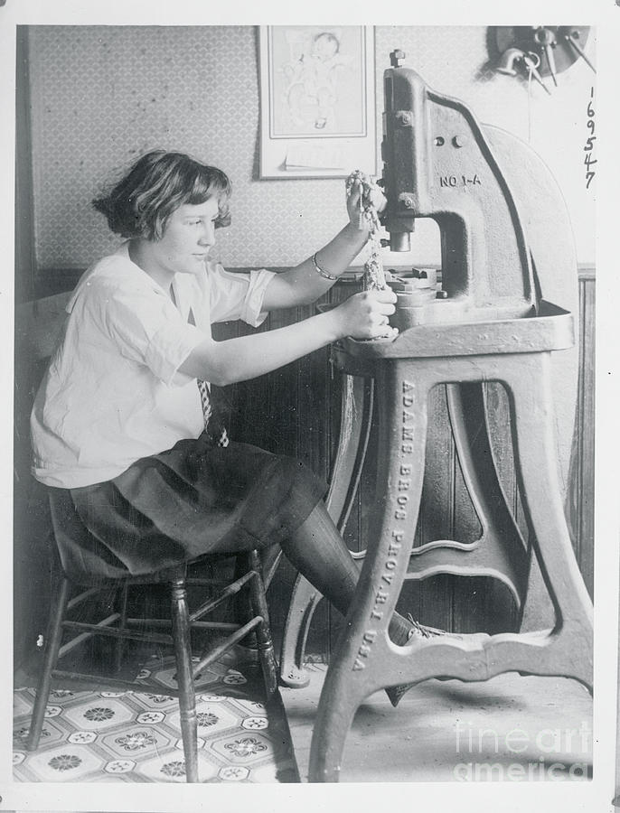 Girl Operating Jewelry Stamping Machine Photograph by Bettmann