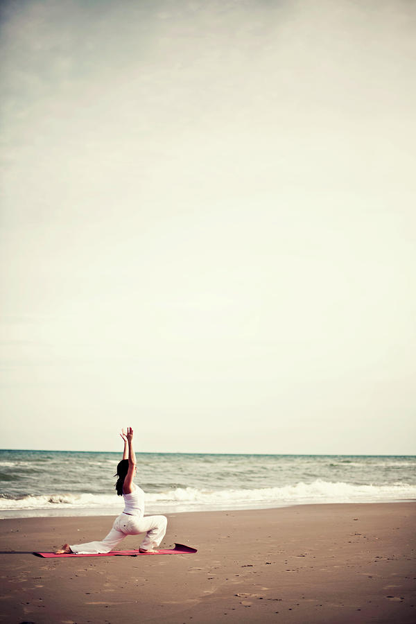 Girl Practicing Yoga On The Beach Photograph by Lindaobrien Photography