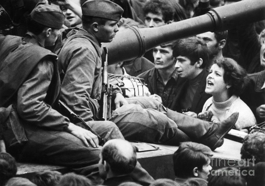 Girl Shouts To Soldiers Seated On Tanks Photograph by Bettmann