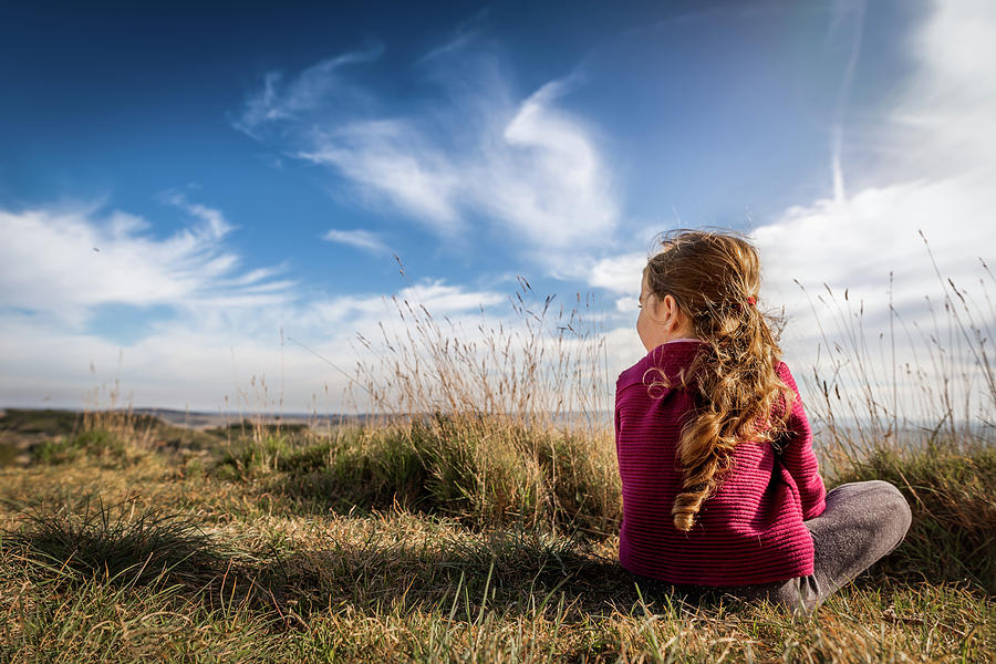 Girl Sits In Sunshine With Back To Camera In South Of France In Summer ...