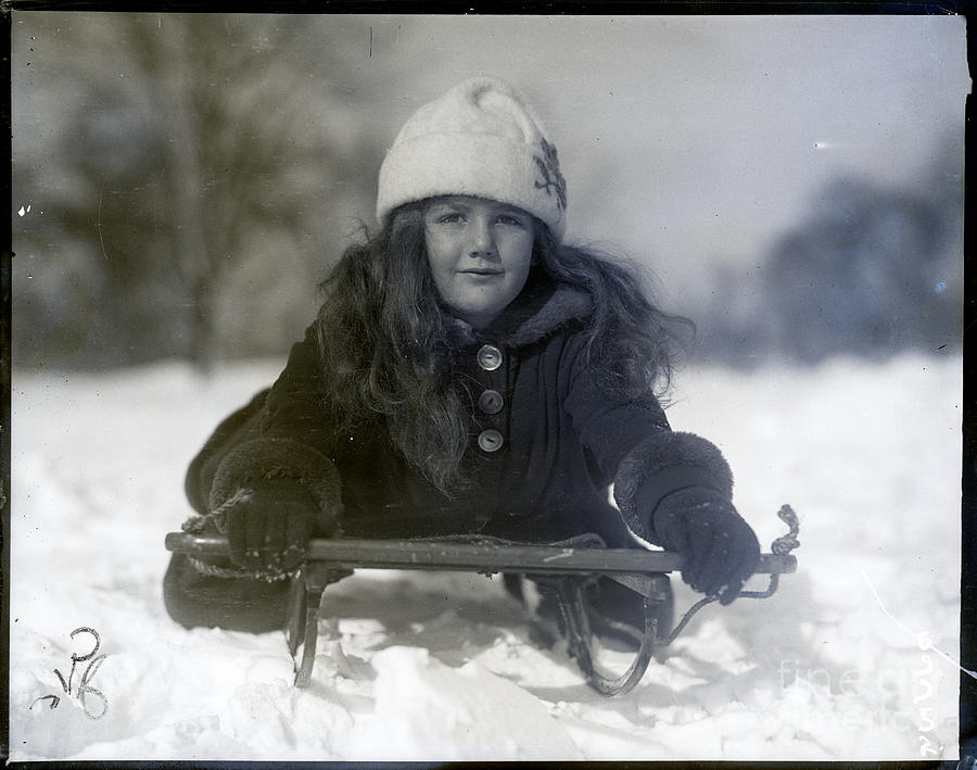 Girl Sledding In Central Park Photograph by Bettmann