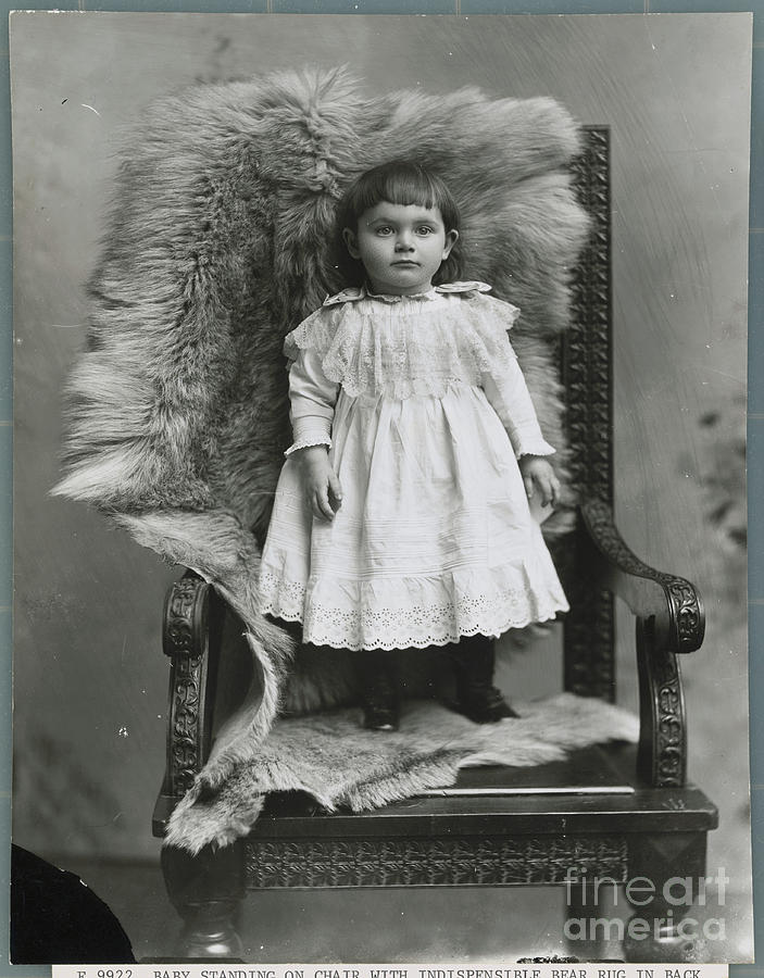 Girl Standing On Chair Photograph by Bettmann