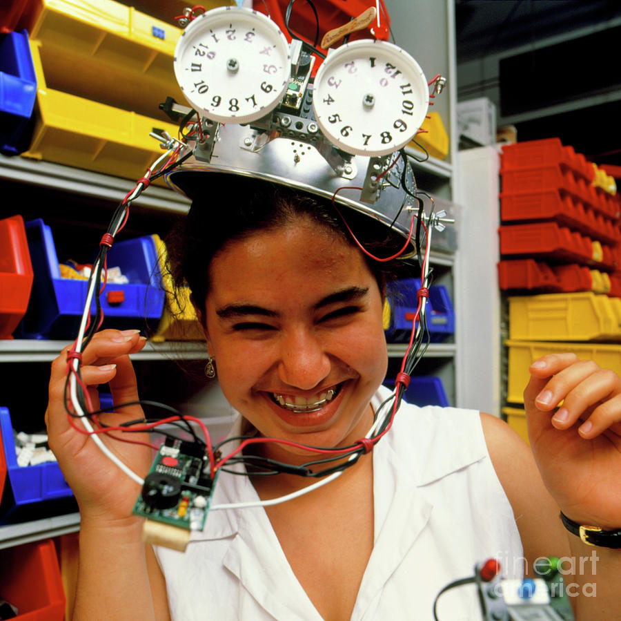 Girl Wearing A Robot Controlled Hat Photograph by Sam Ogden/science Photo Library