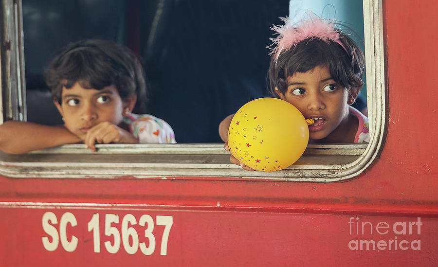 Girls in Sri Lanka in train Photograph by Patricia Hofmeester