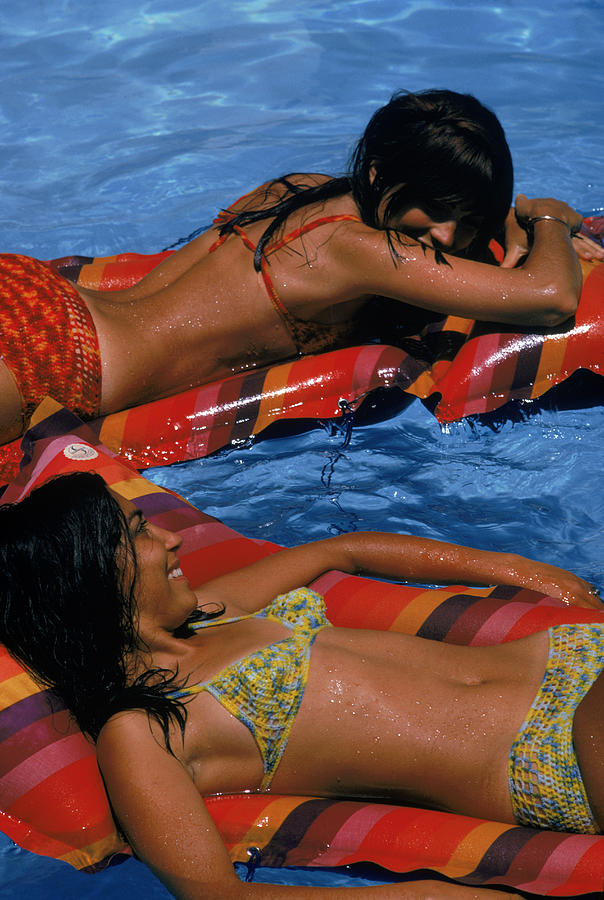 Girls On Lilos Photograph by Slim Aarons
