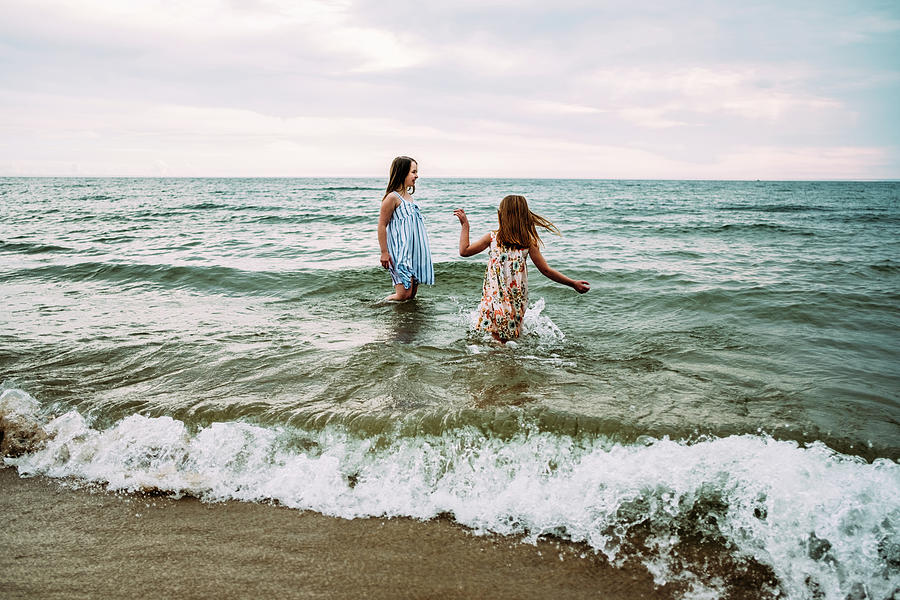 Girls Playing Fully Dressed In Lake Michigan On Summer Day Photograph