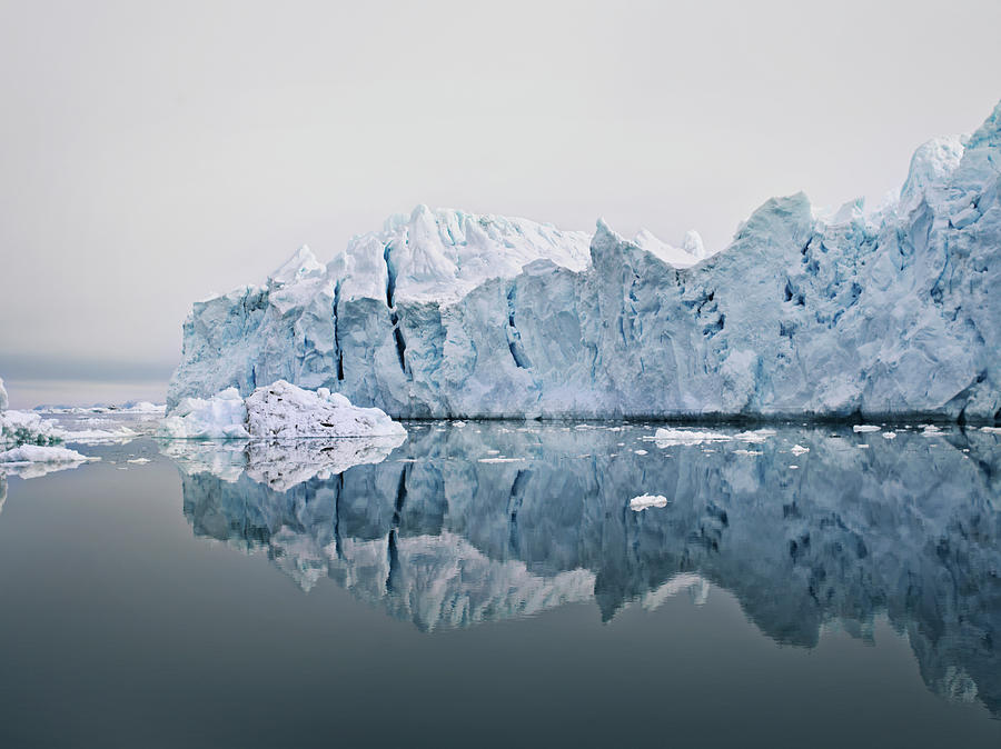 Glacier Reflected In Still Lake Photograph by Niels Busch