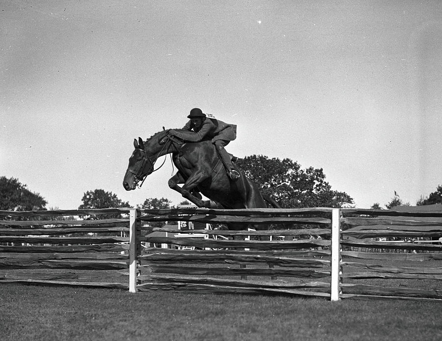 Gladys Hopkins Whitney Jumps Bogdam Photograph by Bert Morgan