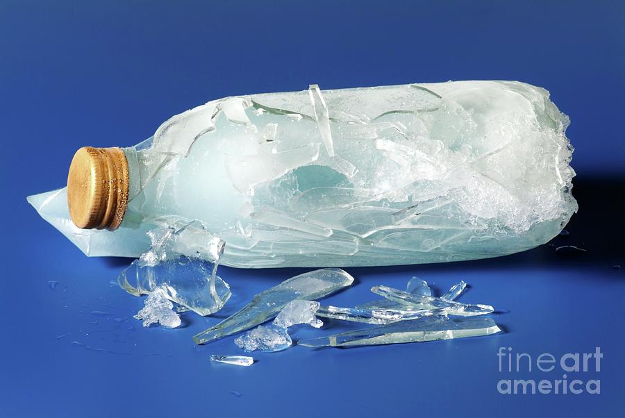 Glass Bottle Shattered By Frozen Water Photograph by Martyn F. Chillmaid/science Photo Library