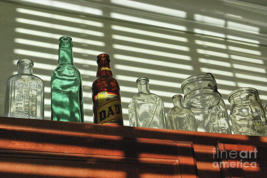 Glass Bottles And Sunlight Photograph by Phil Perkins