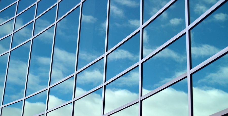 Glass Building Reflecting Blue Skies Photograph by Michelangeloboy