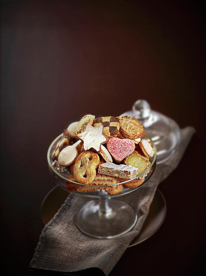 Glass Dish Of Mixed Bredele Biscuits Photograph by Perrin