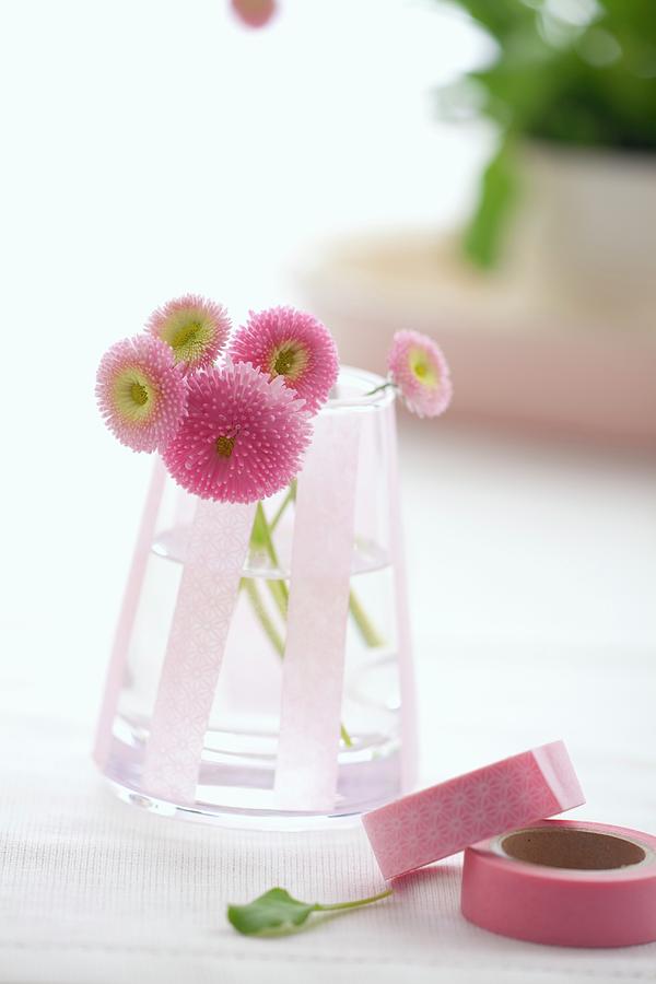 Glass Jar With Decorative Masking Tapes, Pink Daisies Inside Photograph by Studio Lipov