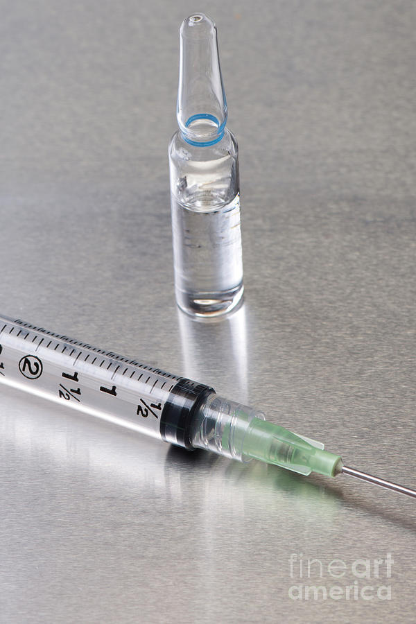 Premium Photo  Ampoule bottle with insulin needles and syringes
