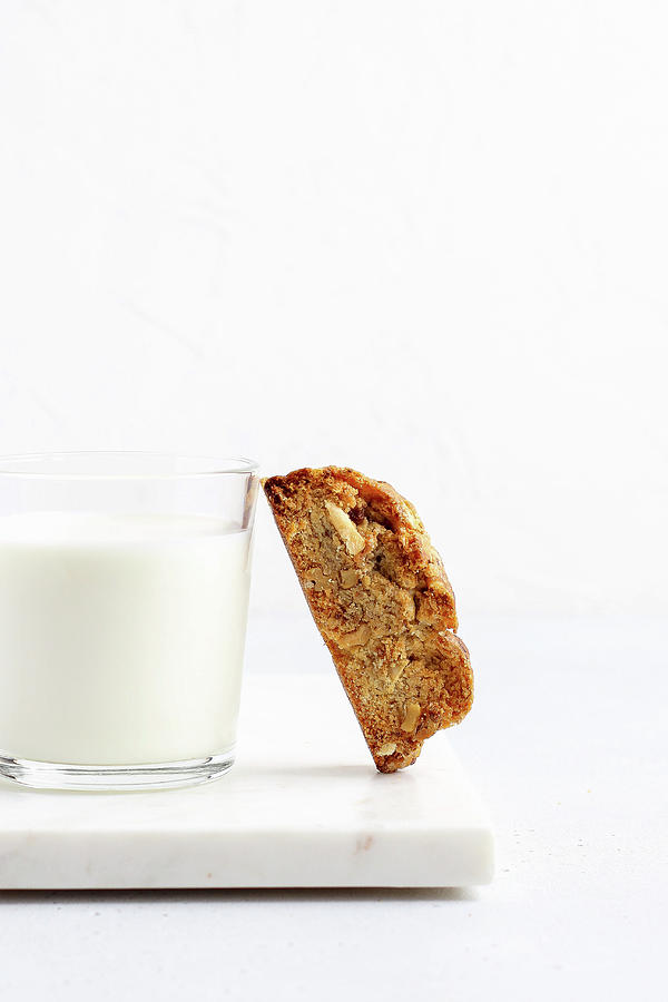 Glass Milk And Biscotti Photograph by Yulia Shkultetskaya