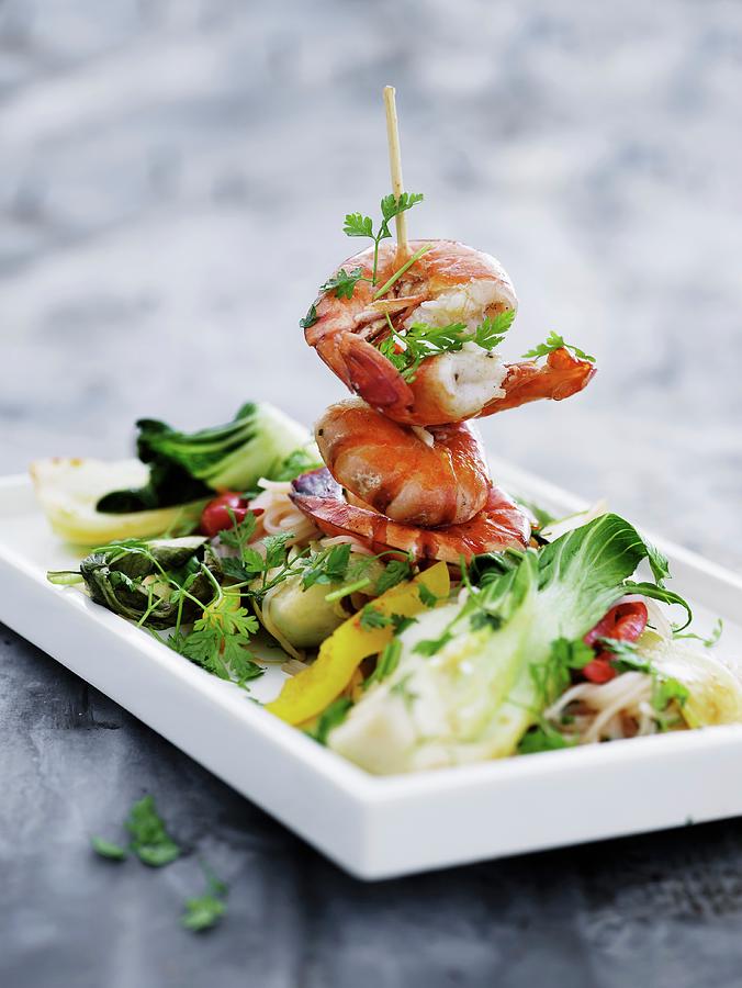 Glass Noodles With Vegetables And A Prawn Skewer Photograph by Mikkel Adsbl