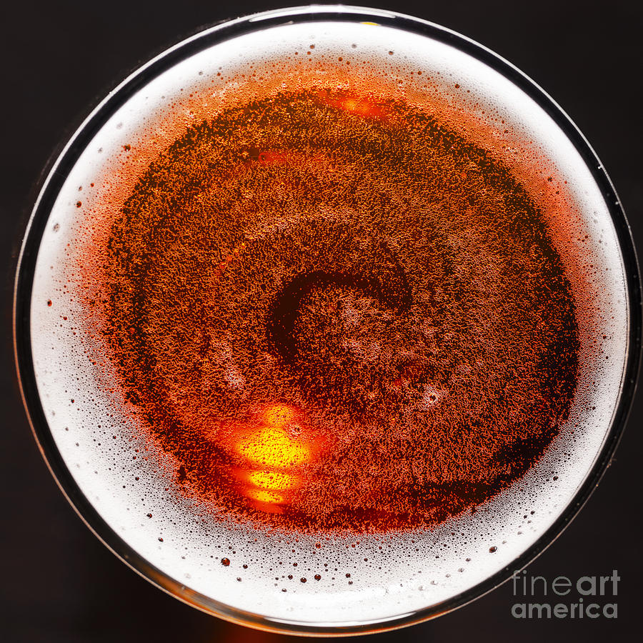 Shadow Photograph - Glass Of Fresh Lager Beer On Black Table by Sergey Peterman