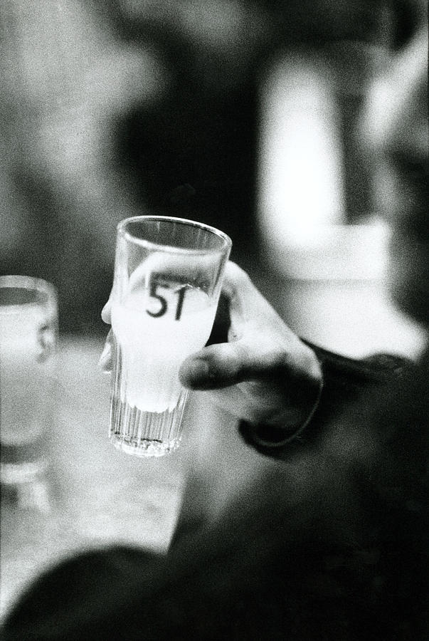 Beer Photograph - Glass Of Pastis In Hand, Black And White by Jalag / Stefan Albrecht
