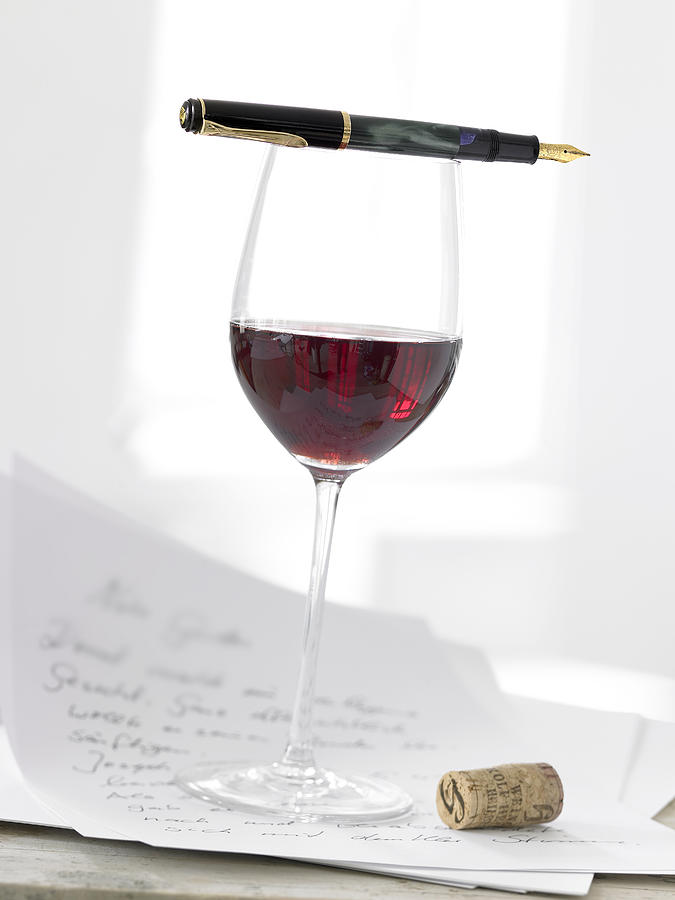 Glass Of Red Wine With Pen, Letter And Cork Photograph by Jalag / Michael Bernhardi