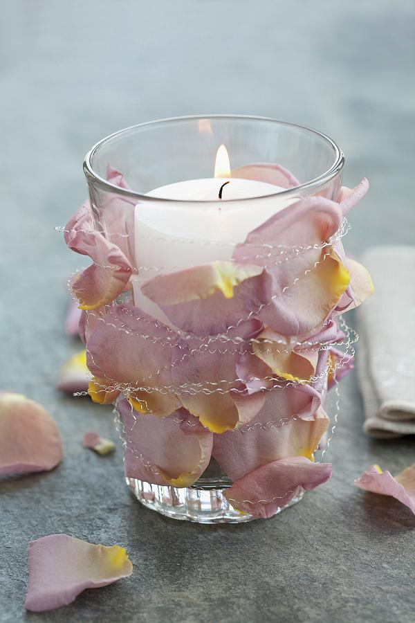 Glass With Rose Petals And Candle Photograph by Martina Schindler