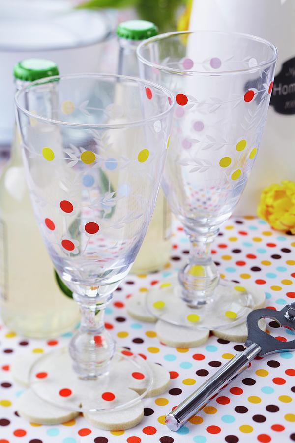 Glasses Decorated With Colourful Dots Photograph by Franziska Taube