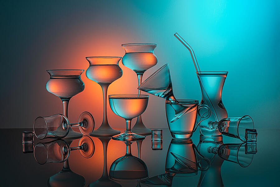 Glasses Light Up With Orange & Aqua Light Photograph by Lydia Jacobs