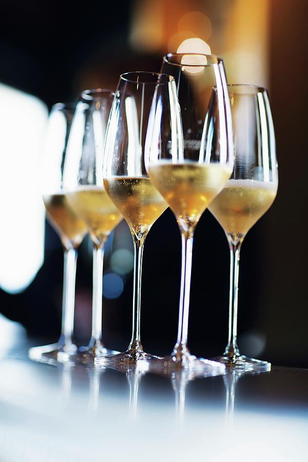 Glasses Of Champagne In The Le Clos Des Terres Soudes Winebar, Champagne, France Photograph by Jalag / Joerg Lehmann