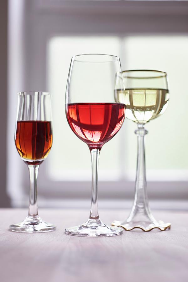 Glasses Of Different Wines Photograph by Oliver Brachat
