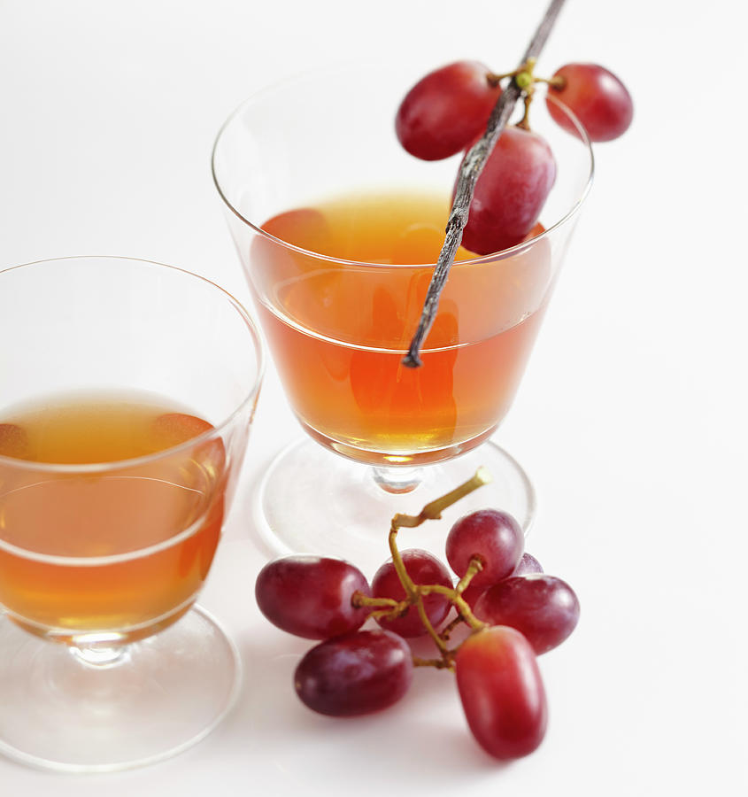 Glasses Of Homemade Grape And Vanilla Liqueur Photograph by Teubner Foodfoto