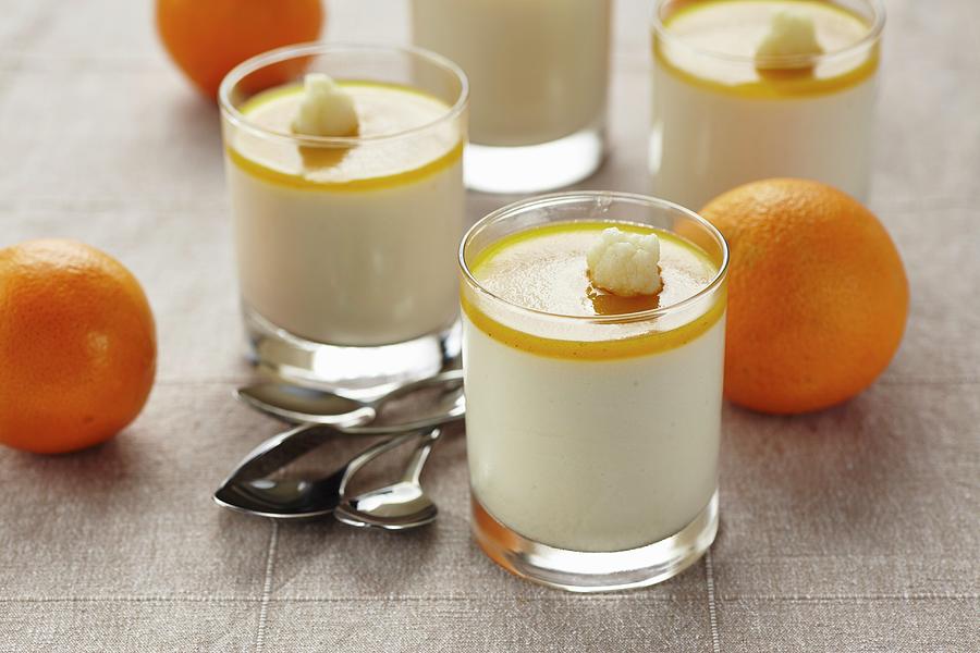 Glasses Of Orange Cream Dessert Photograph by Herbert Lehmann