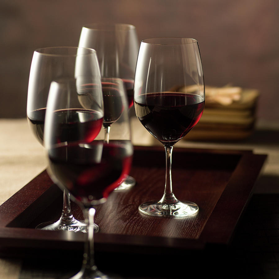 Glasses Of Red Wine Photograph by Leo Gong