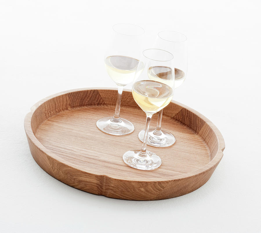 Glasses Of Wine On Round Shaped Solid Oak Wooden Tray Photograph by ...