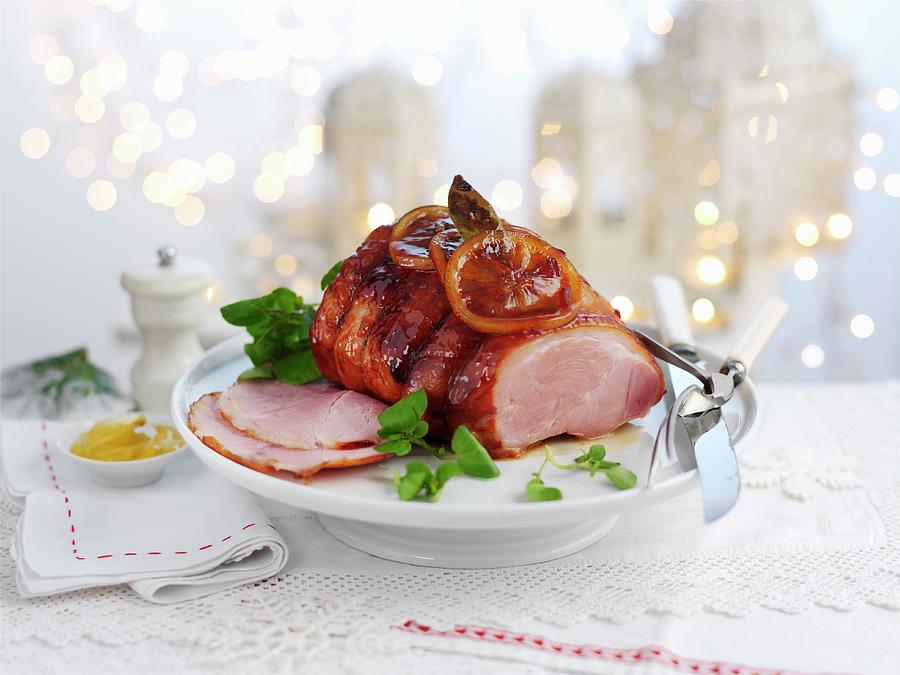 Glazed Roast Pork For Christmas Dinner Photograph by Ian Garlick